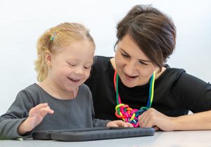 Educator working with special needs student